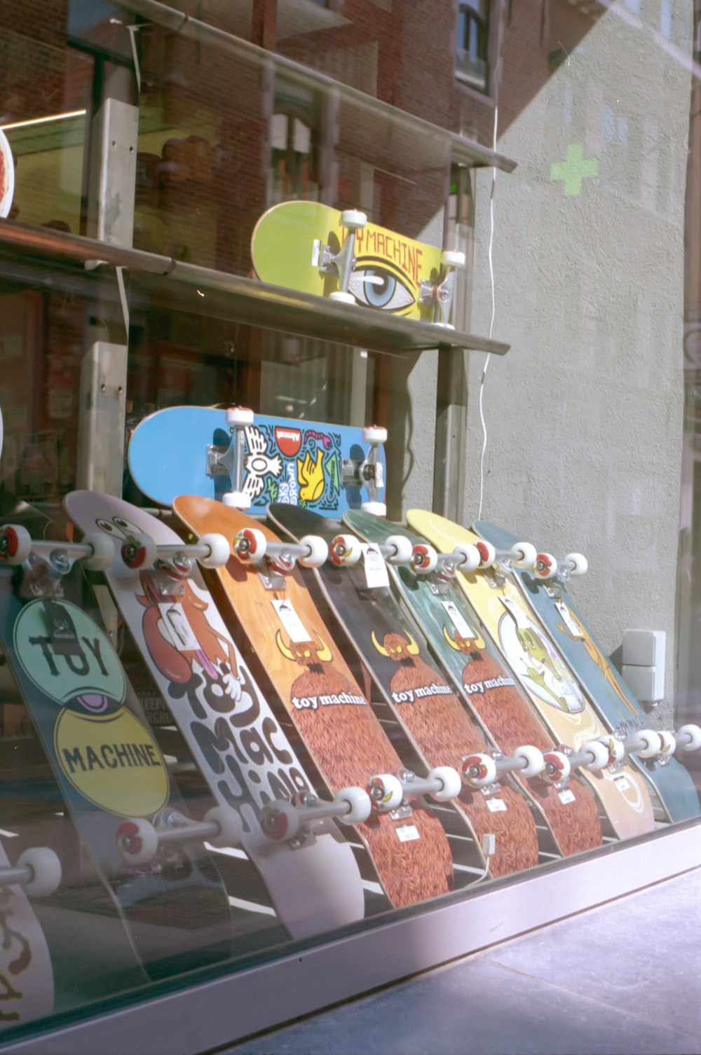 brown and white wooden skateboard deck