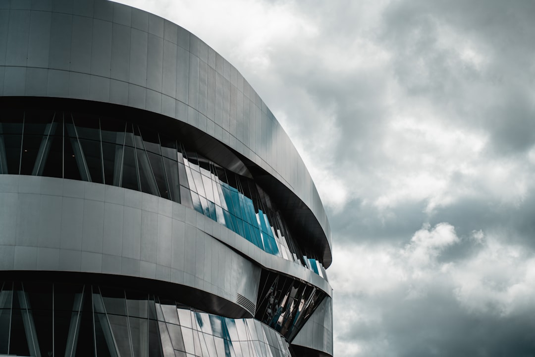 gray concrete building under gray clouds