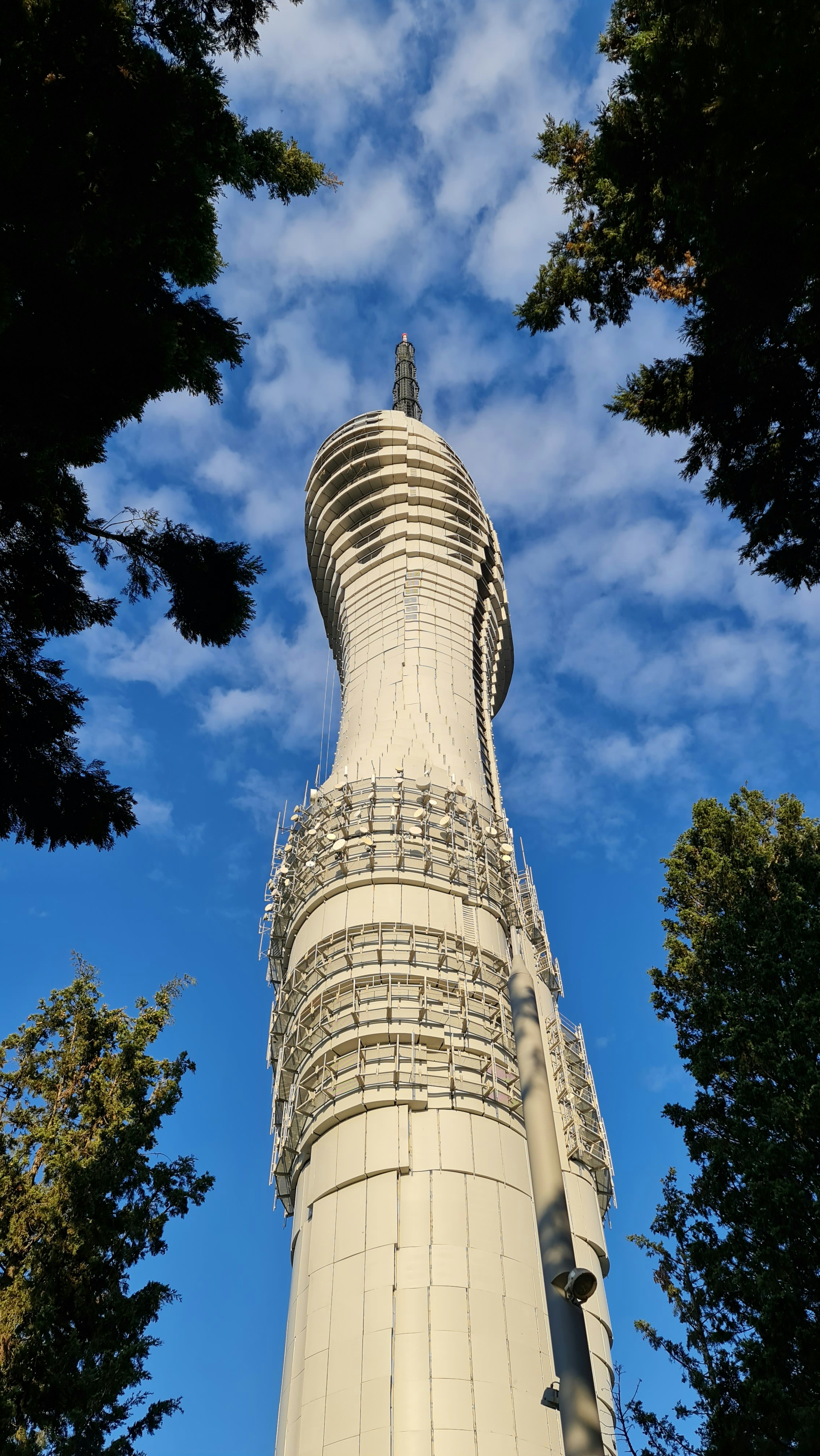 white concrete tower under blue sky during daytime
