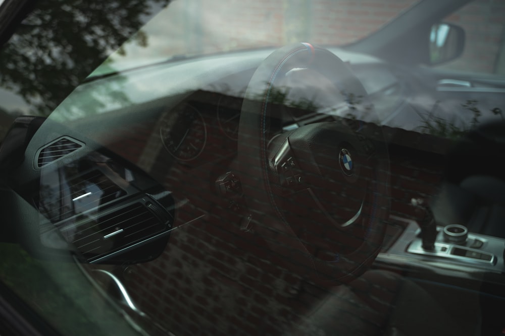 black car on road during daytime