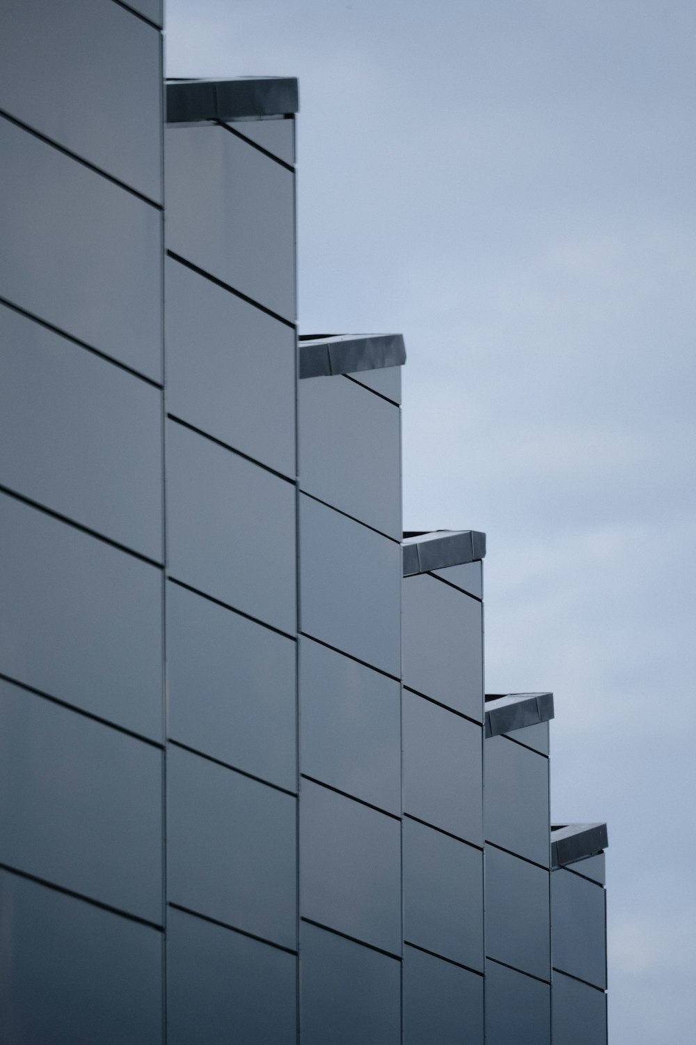 white concrete building under blue sky during daytime