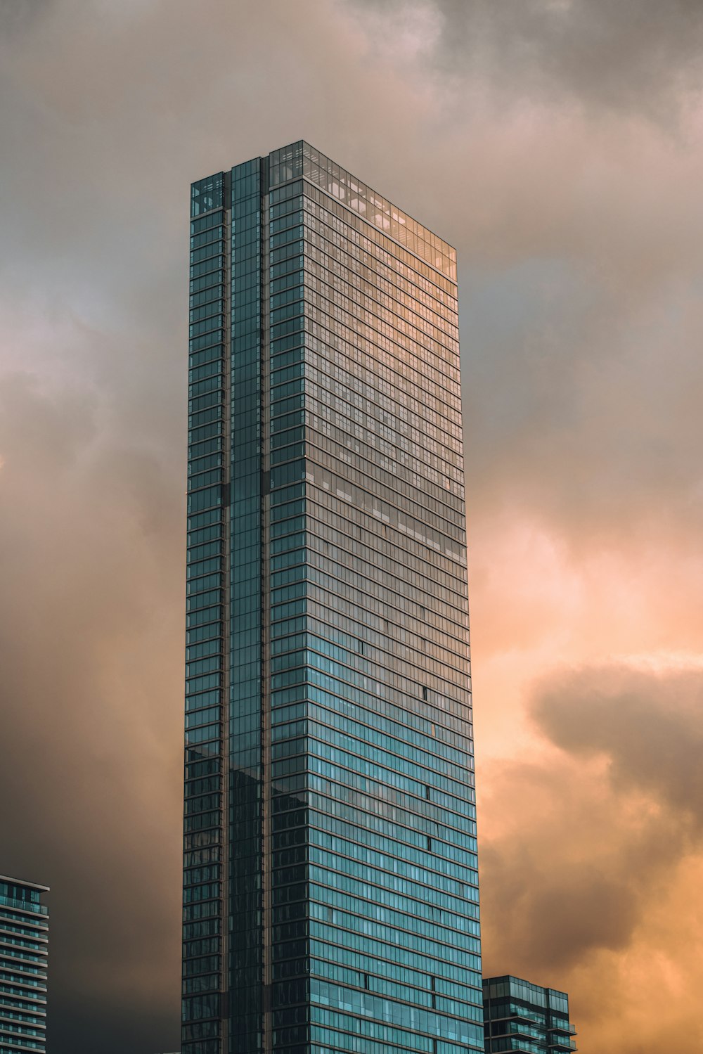 gray concrete building under gray clouds