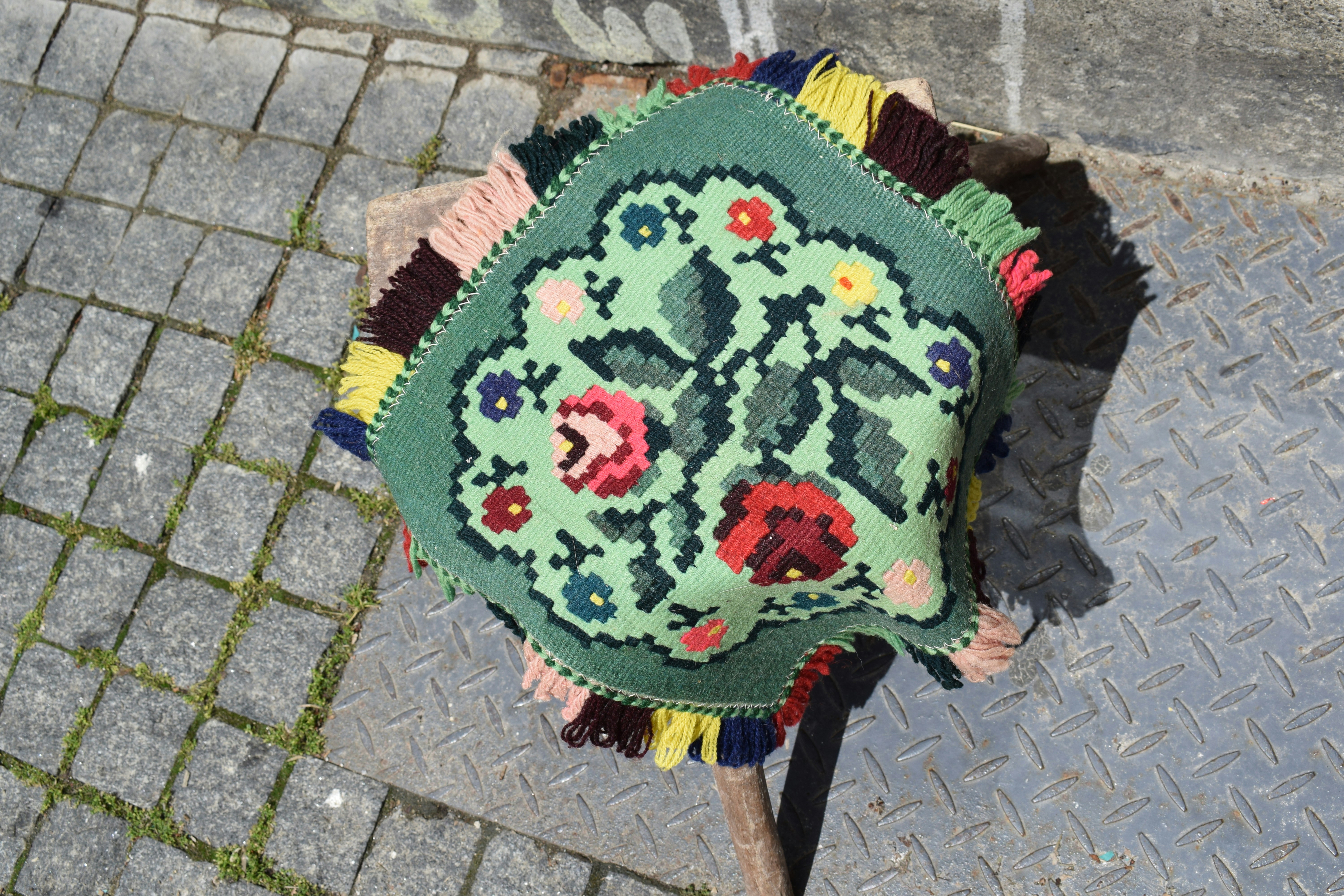 green and red floral textile