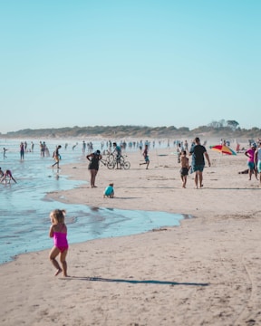 A group of tourists enjoying the beach activities in Zapponeta.