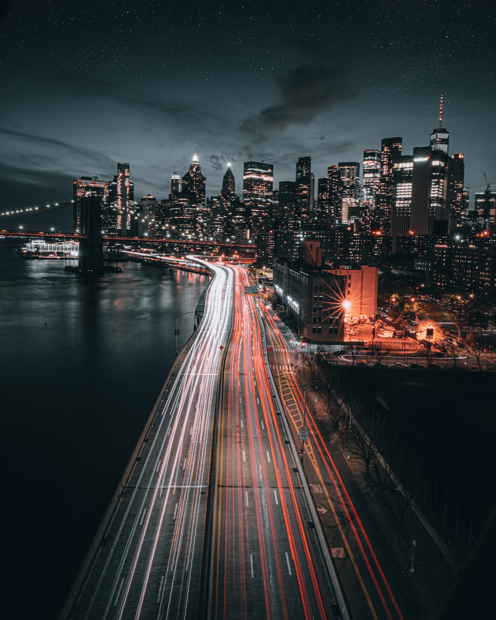 time lapse photography of city lights during night time