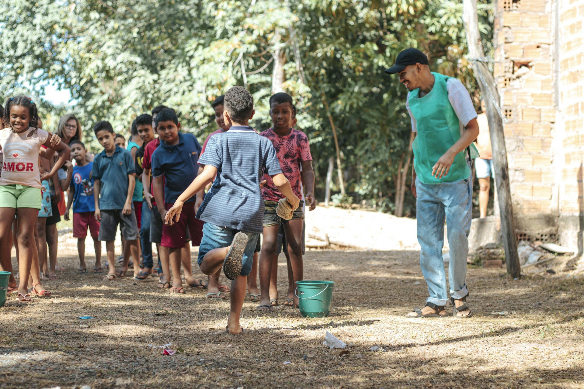 people walking on dirt road during daytime