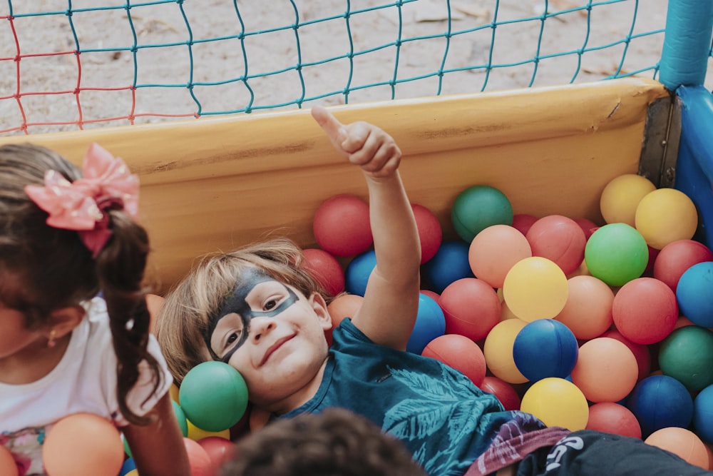 A group of children playing a game of mini golf photo – Group of kids Image  on Unsplash