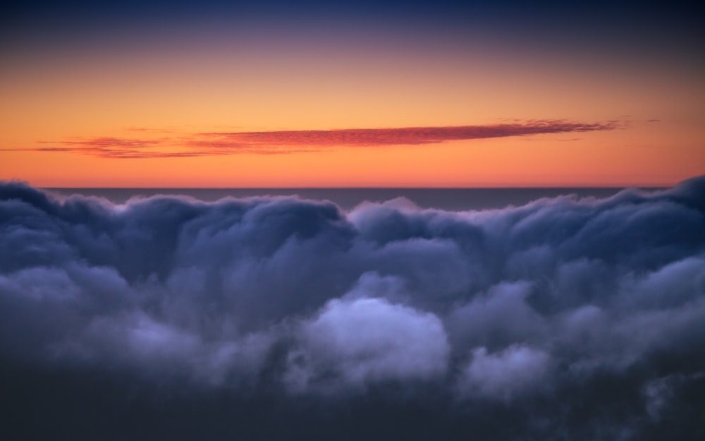 white clouds during golden hour