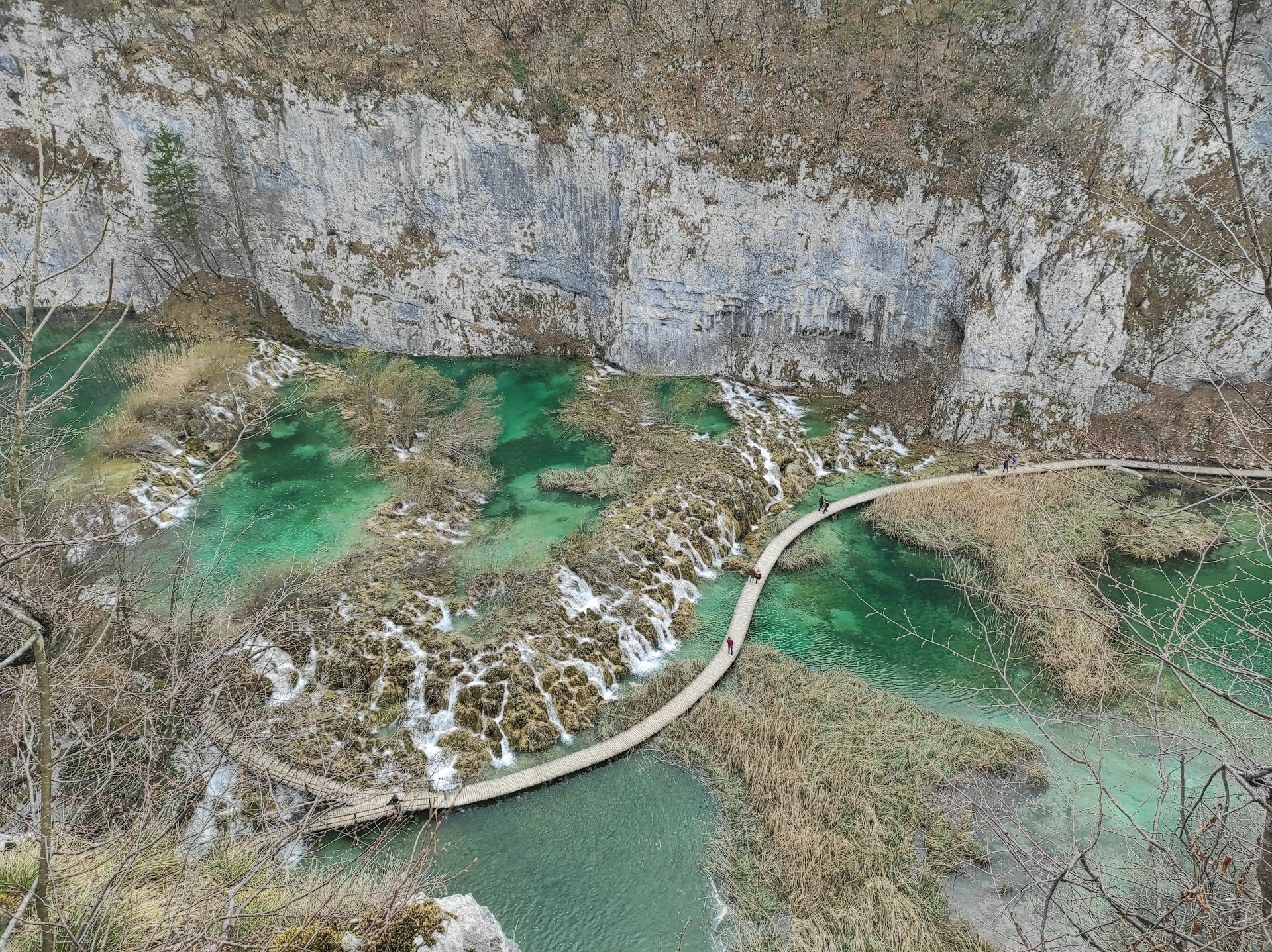aerial view of river between rocky mountains during daytime