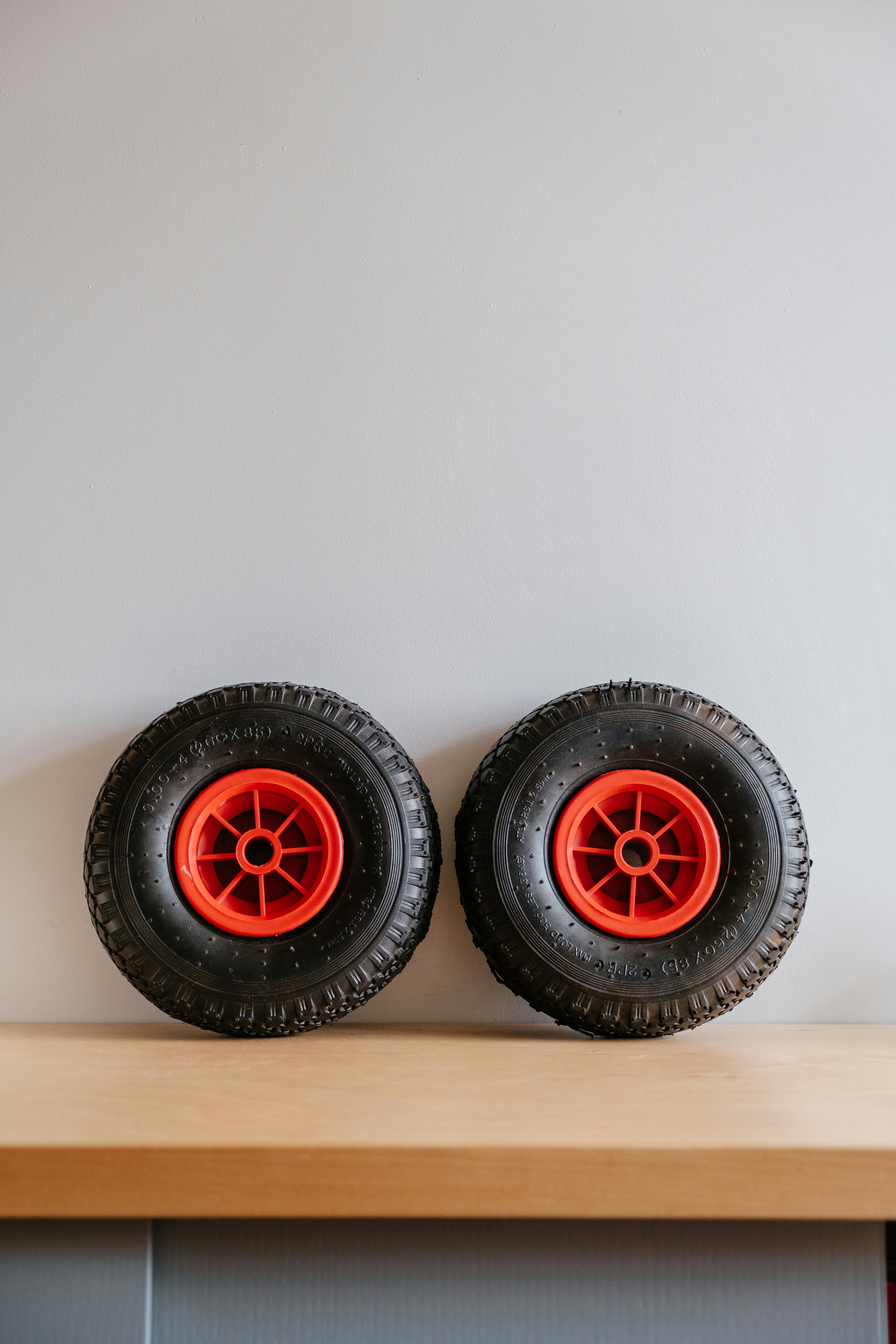 3 black and red wheel