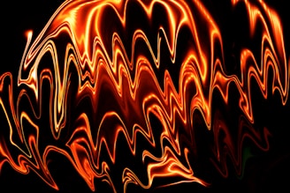 Audio system visualization showing pixel waveforms pulsing in lava orange against a dark backdrop.
