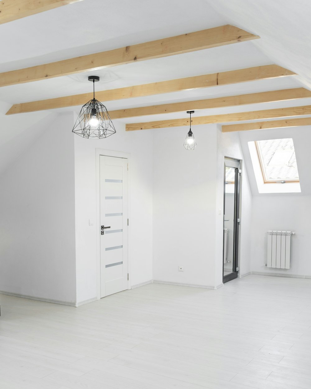 white wooden cabinet near white wooden door