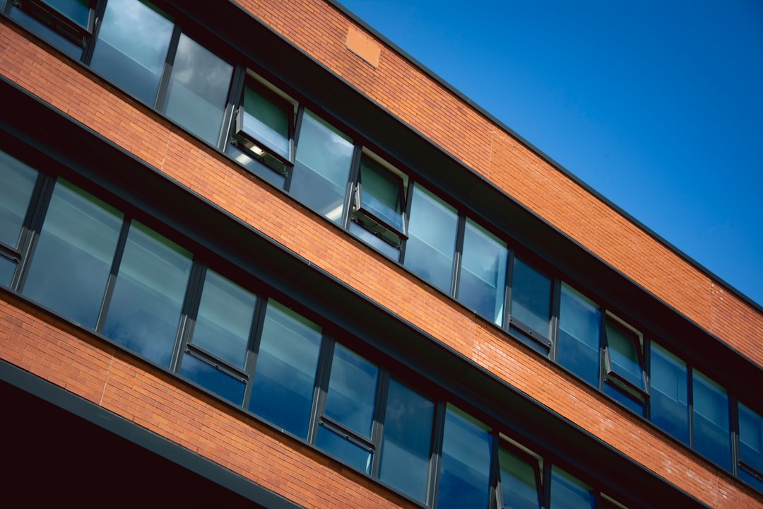 brown concrete building under blue sky during daytime