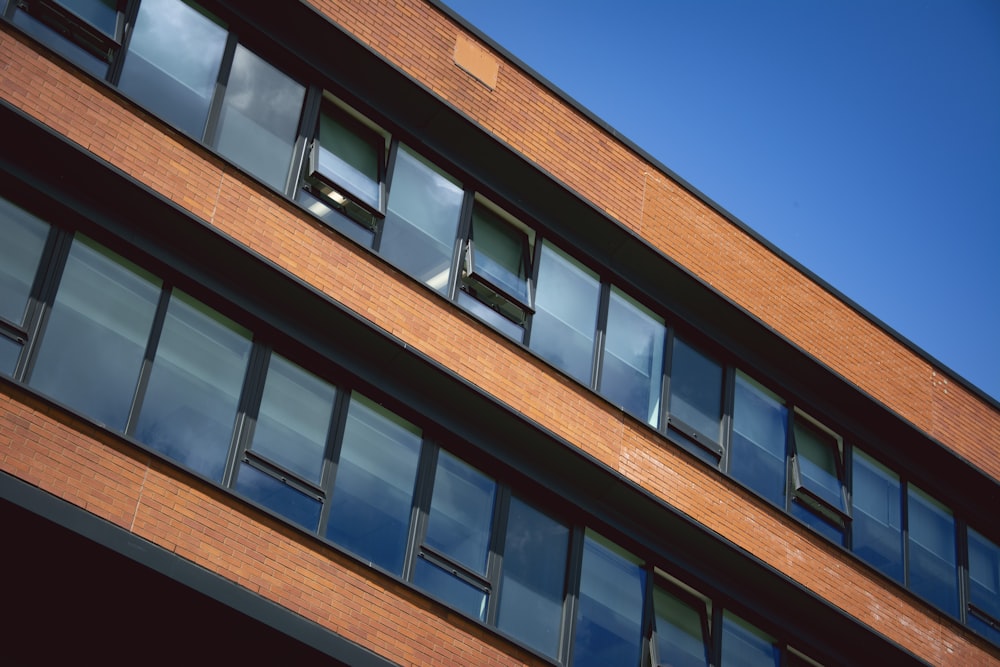 brown concrete building under blue sky during daytime