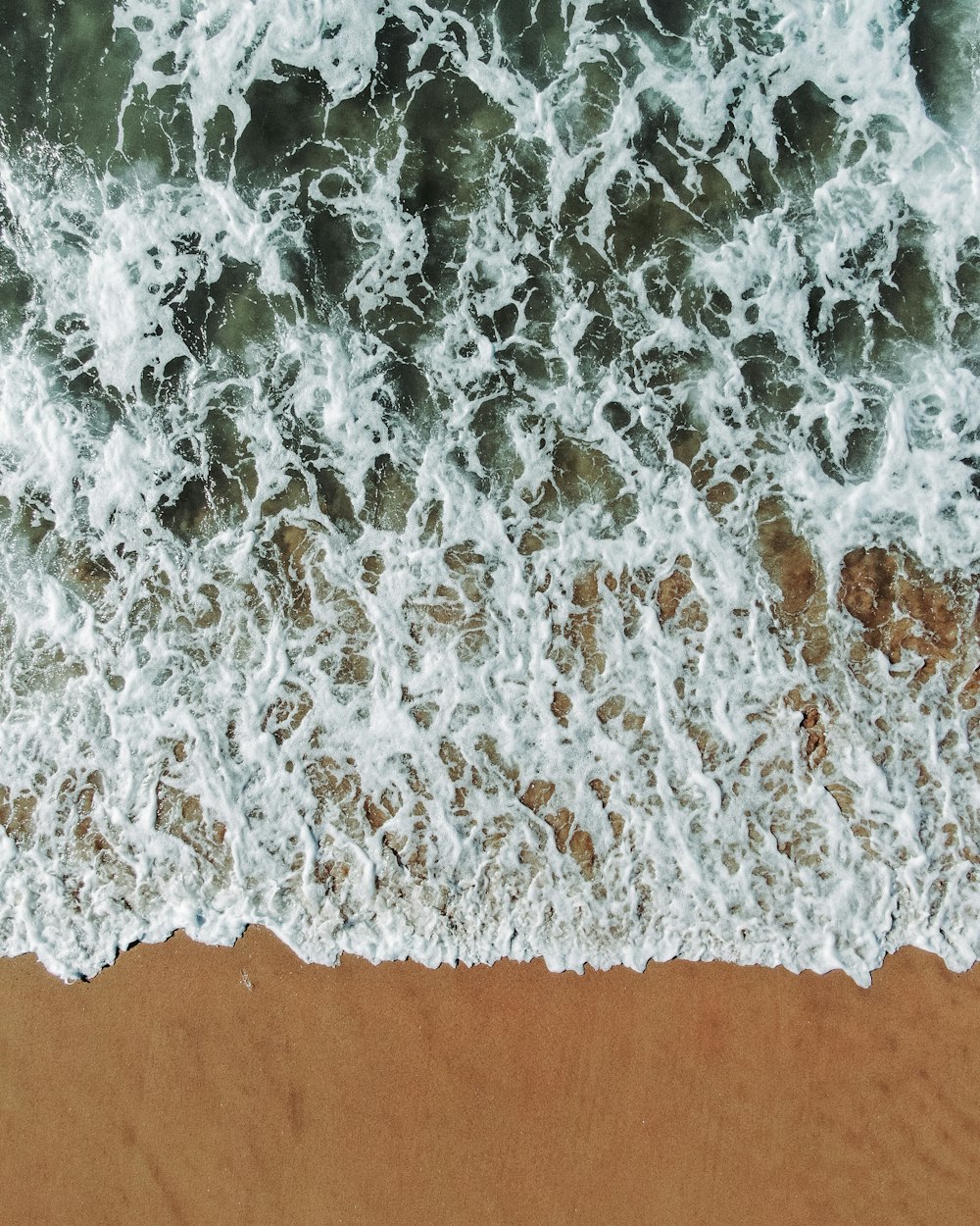 white textile on brown wooden table