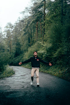 Happy man enjoying outdoor walk after weight loss journey
