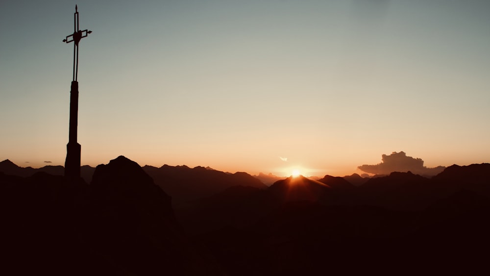 silhouette of mountains during sunset