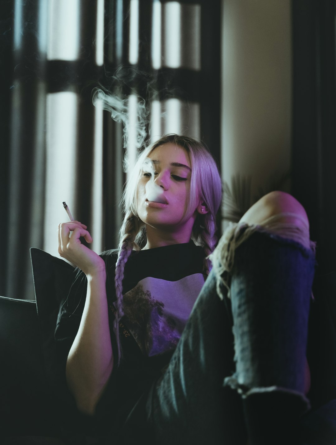 woman in black long sleeve shirt using black tablet computer