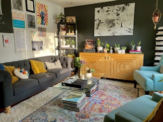 brown wooden cabinet near gray couch