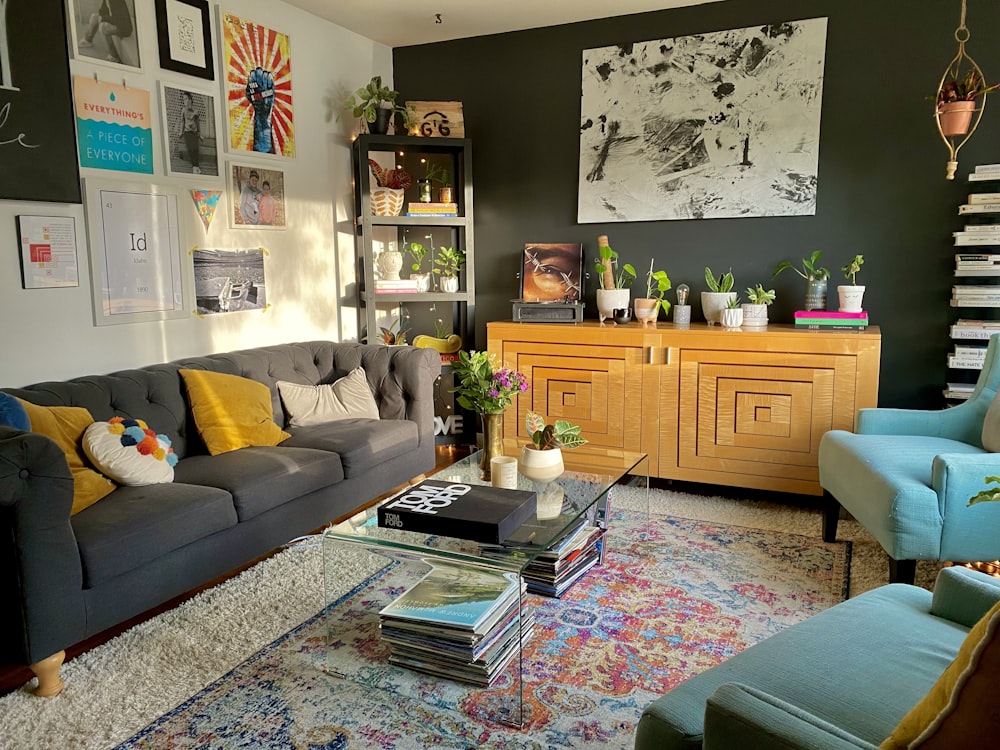 brown wooden cabinet near gray couch