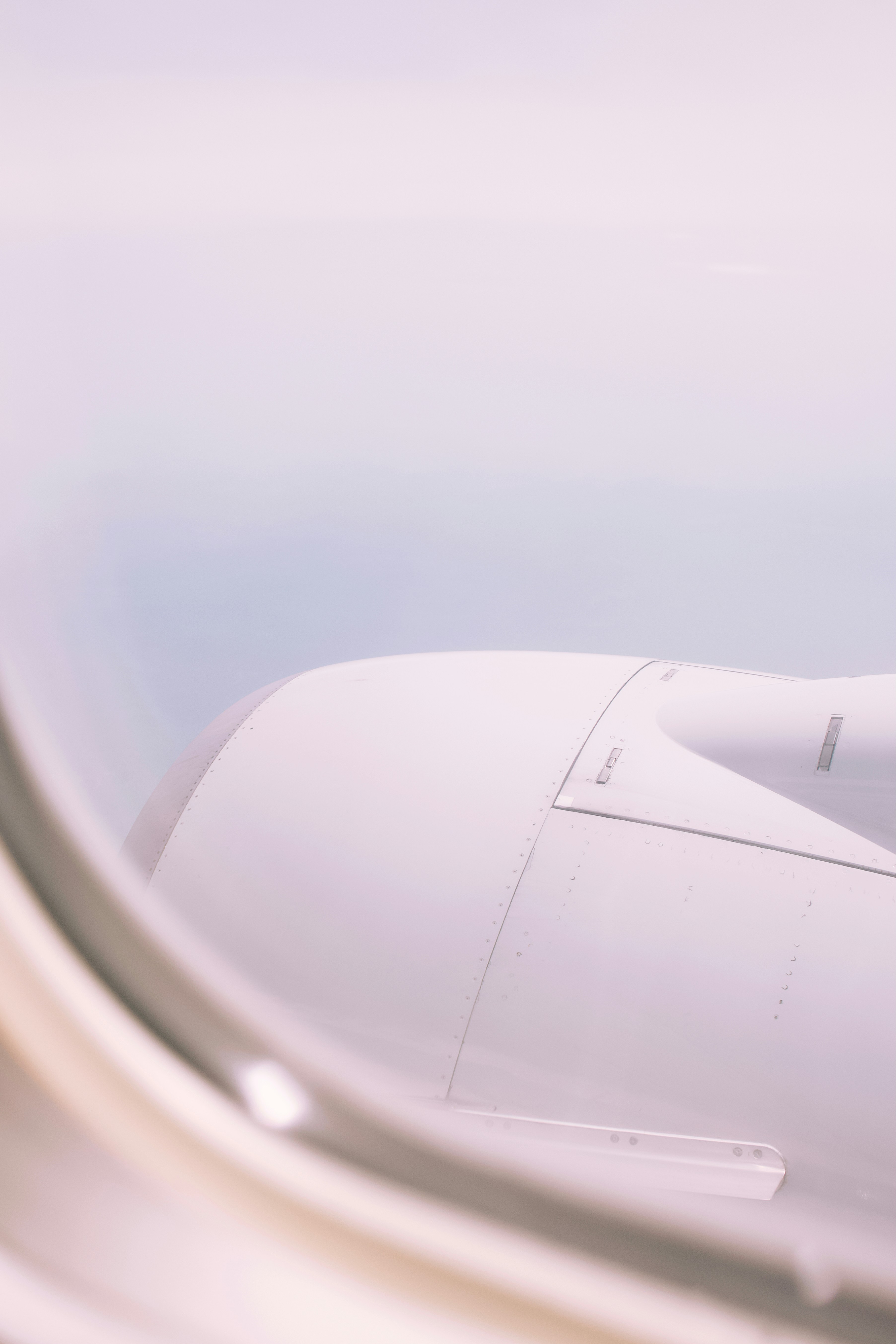 Black And White Plane Under White Clouds During Daytime Photo Free Flying Image On Unsplash