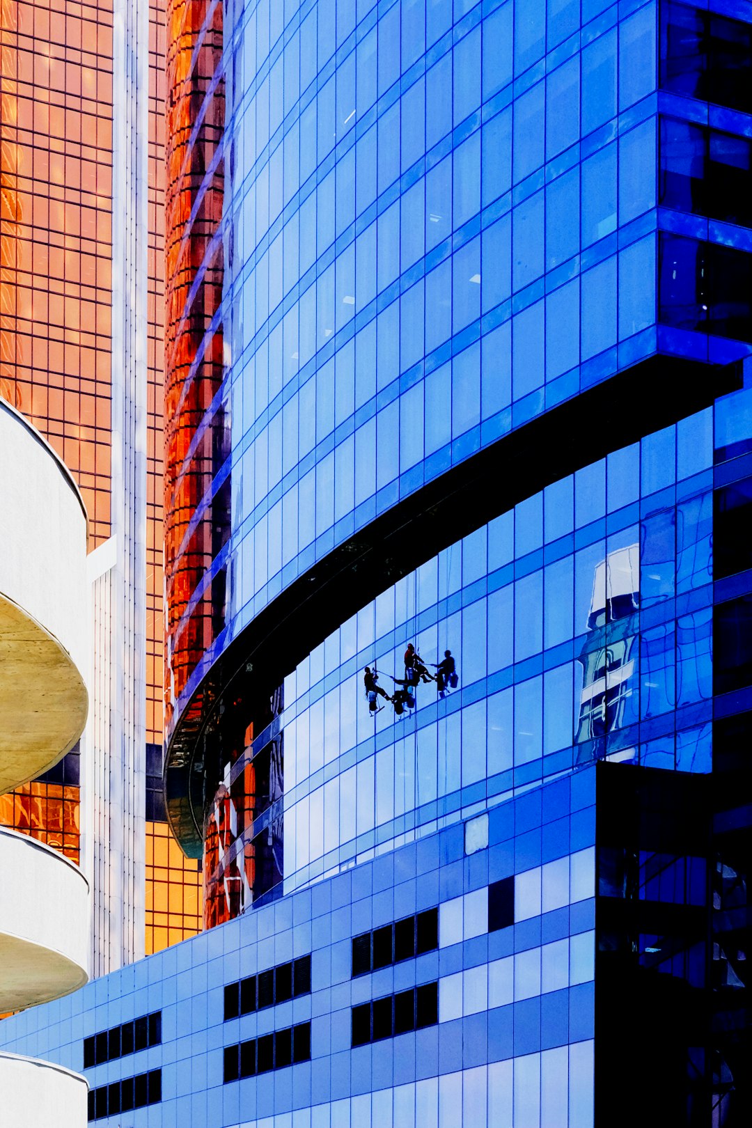 blue and white glass walled building