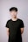 man in black crew neck t-shirt