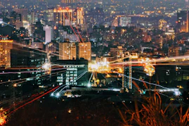 city with high rise buildings during night time