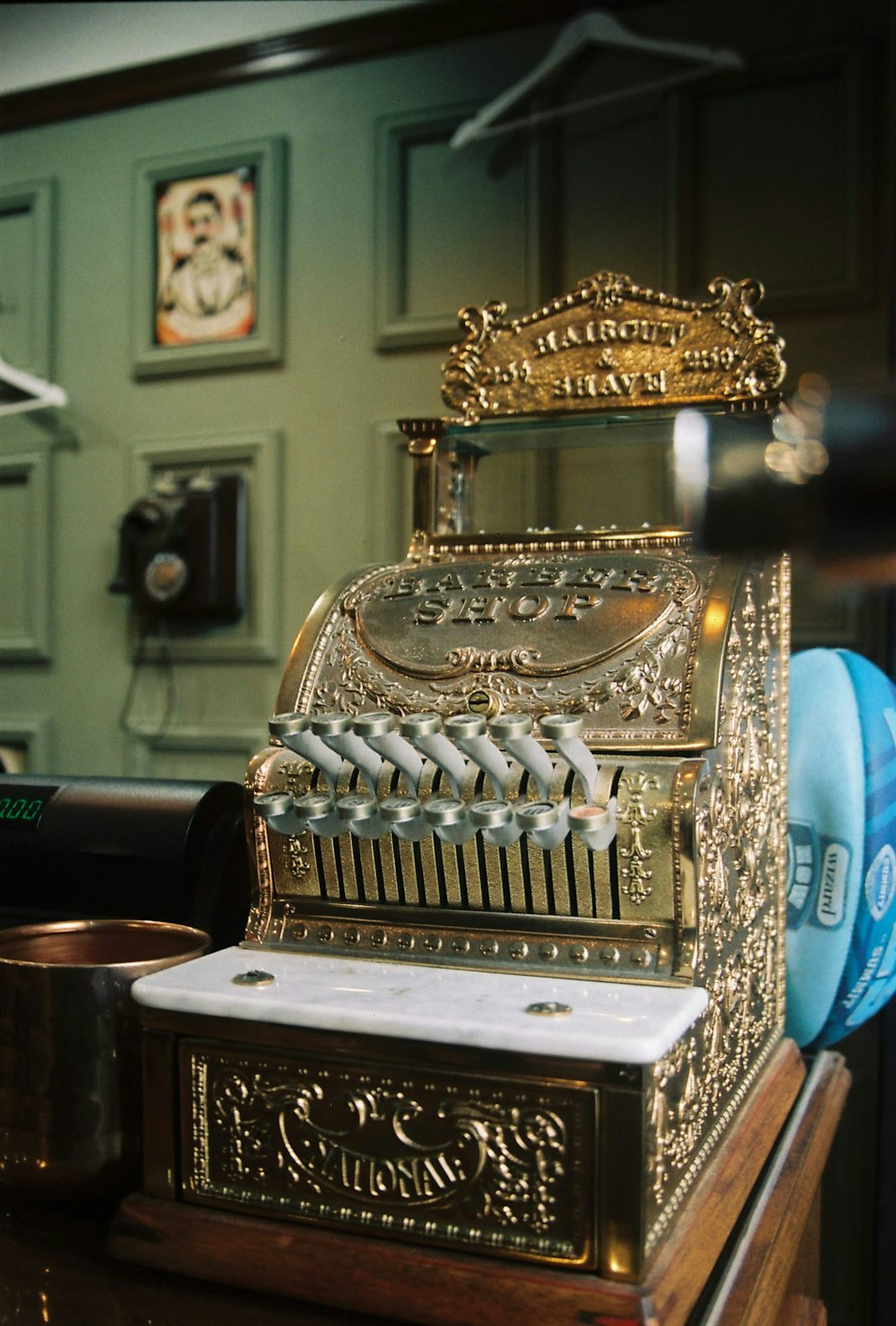 blue and silver typewriter on table