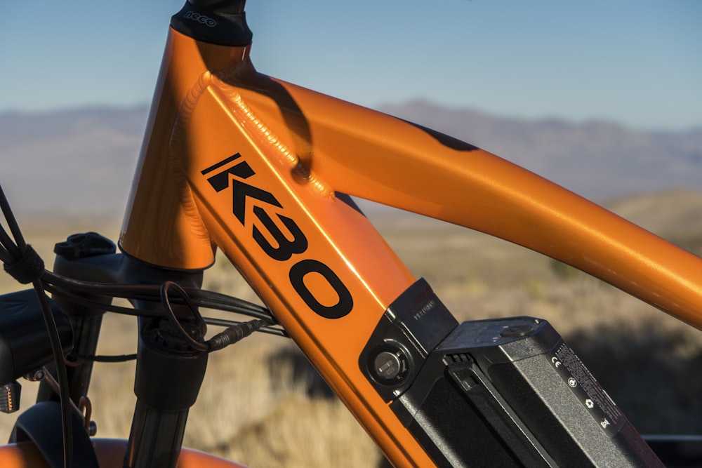 orange and black bicycle handle bar