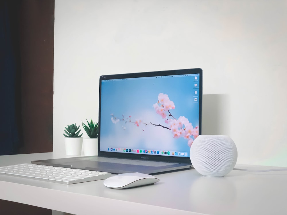 silver imac on white table
