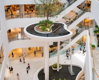 people walking inside white building