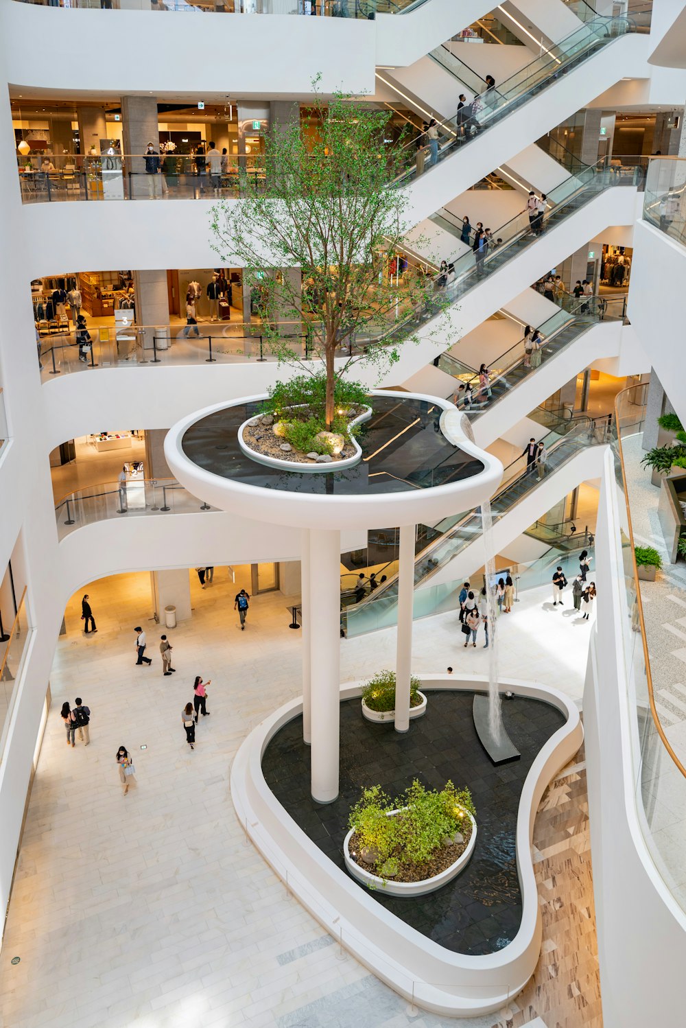 people walking inside white building