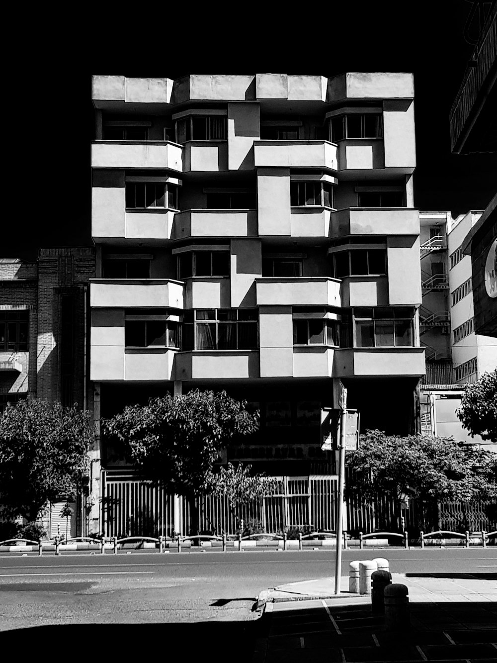 grayscale photo of concrete building