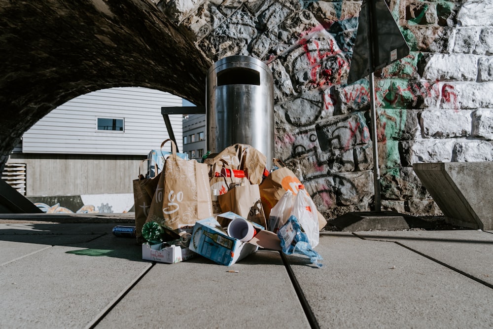 garbage bags on gray metal tank