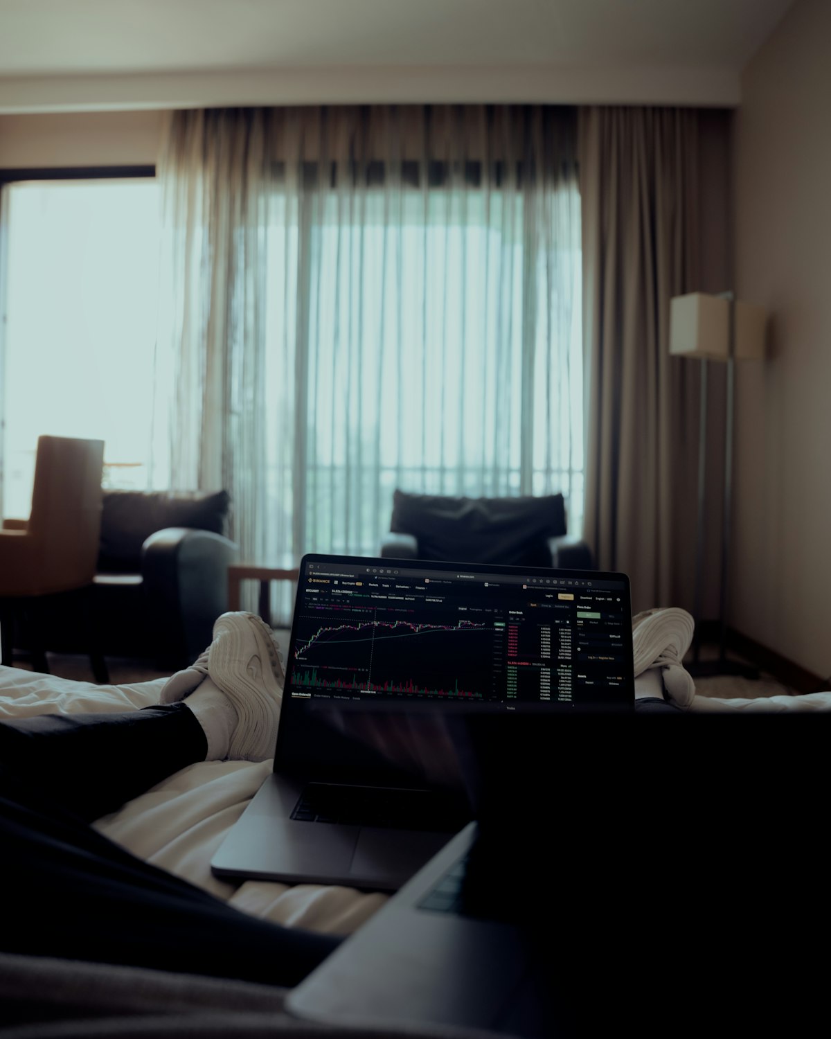 Stock market trading screens displaying financial data representing the divergence between Dow and Nasdaq