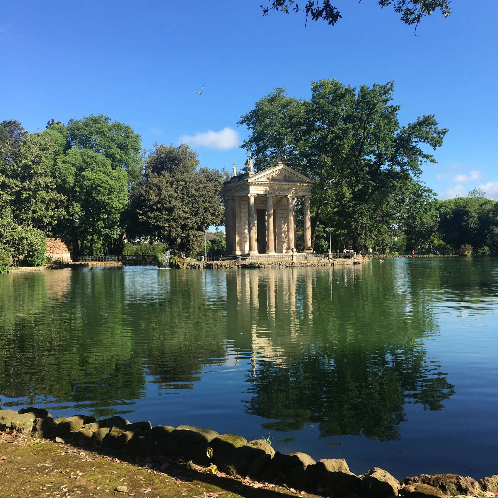The small classical temple beside the lake in Rome's Villa Borghese gardens