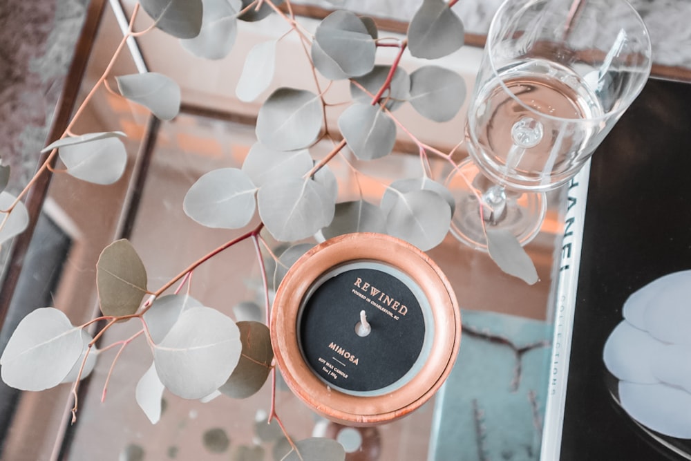 brown wooden round container on white table