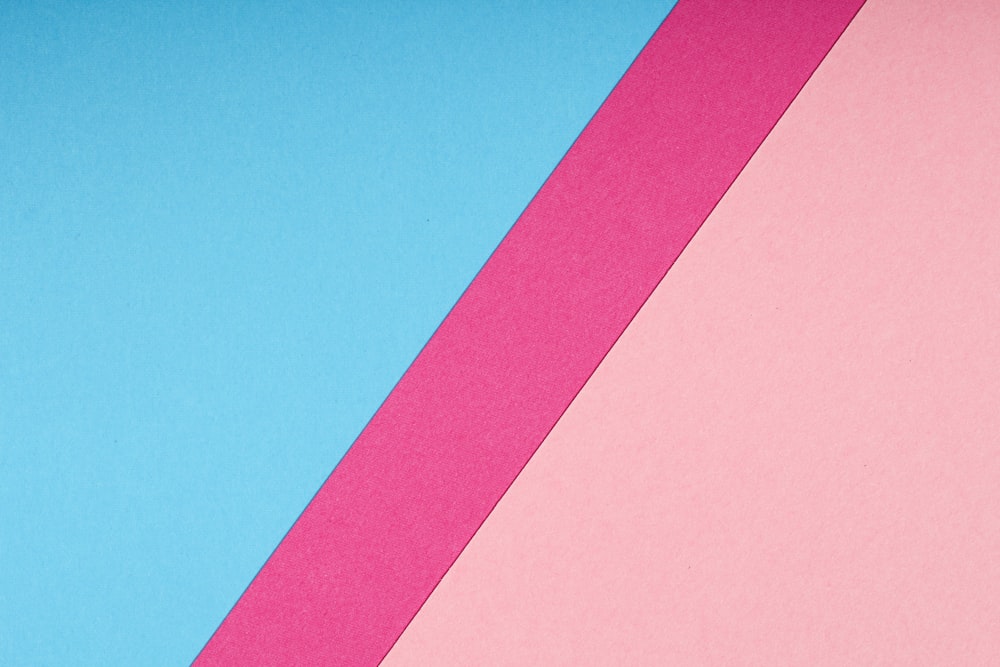 pink paper on blue background