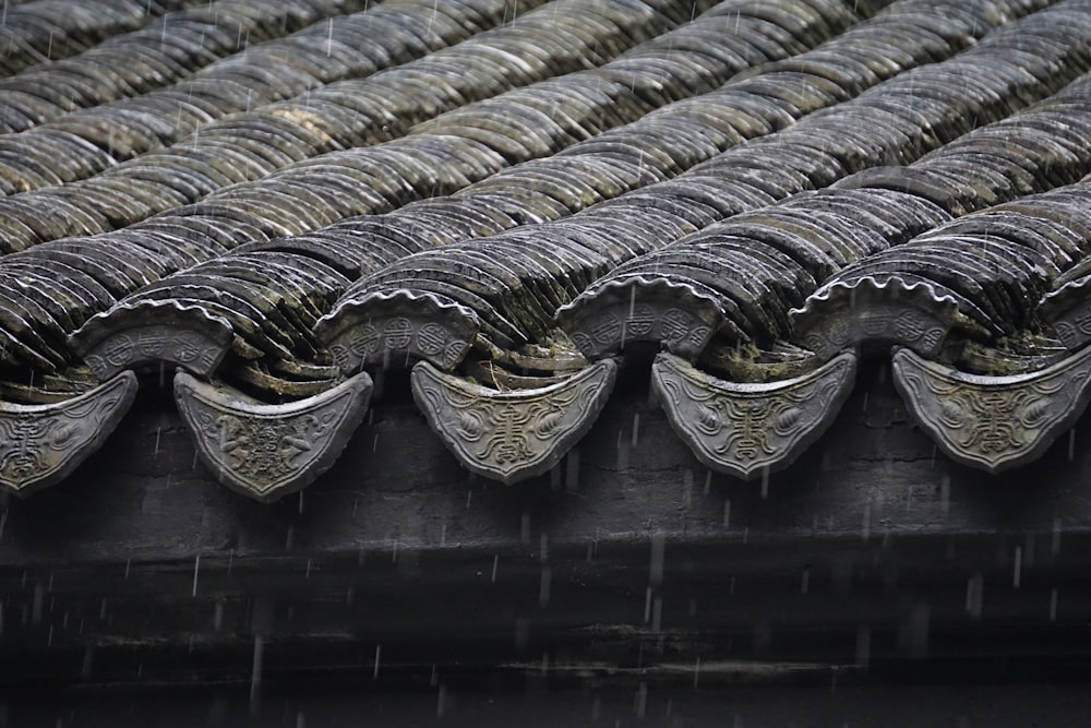 black roof tiles in close up photography
