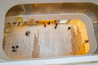 Interior view of a commercial lobby with elegant lighting and marble floors.