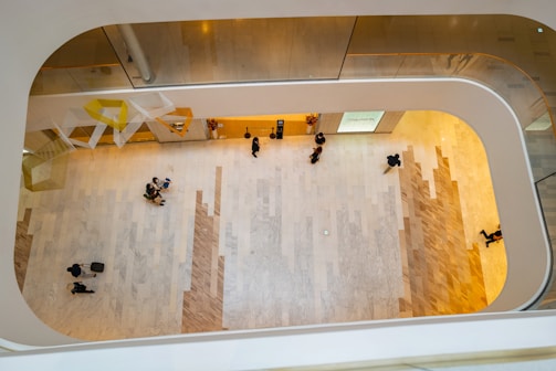 Interior view of a commercial lobby with elegant lighting and marble floors.