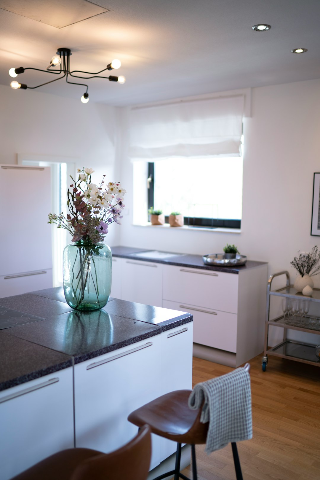 white wooden kitchen cabinet with sink