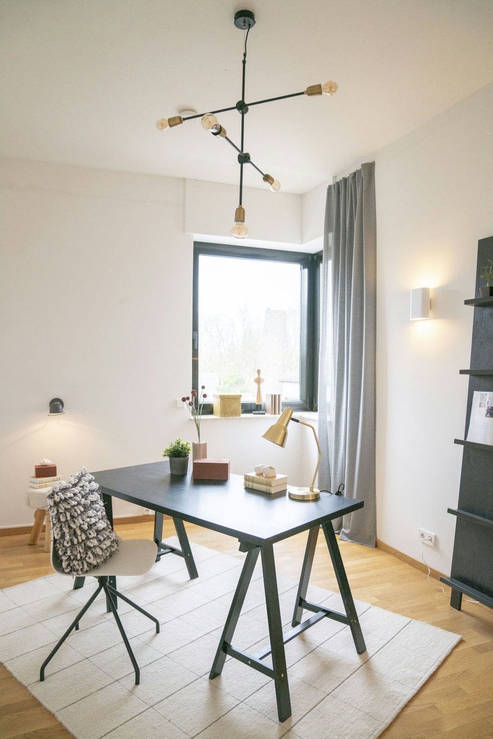 black metal table near window