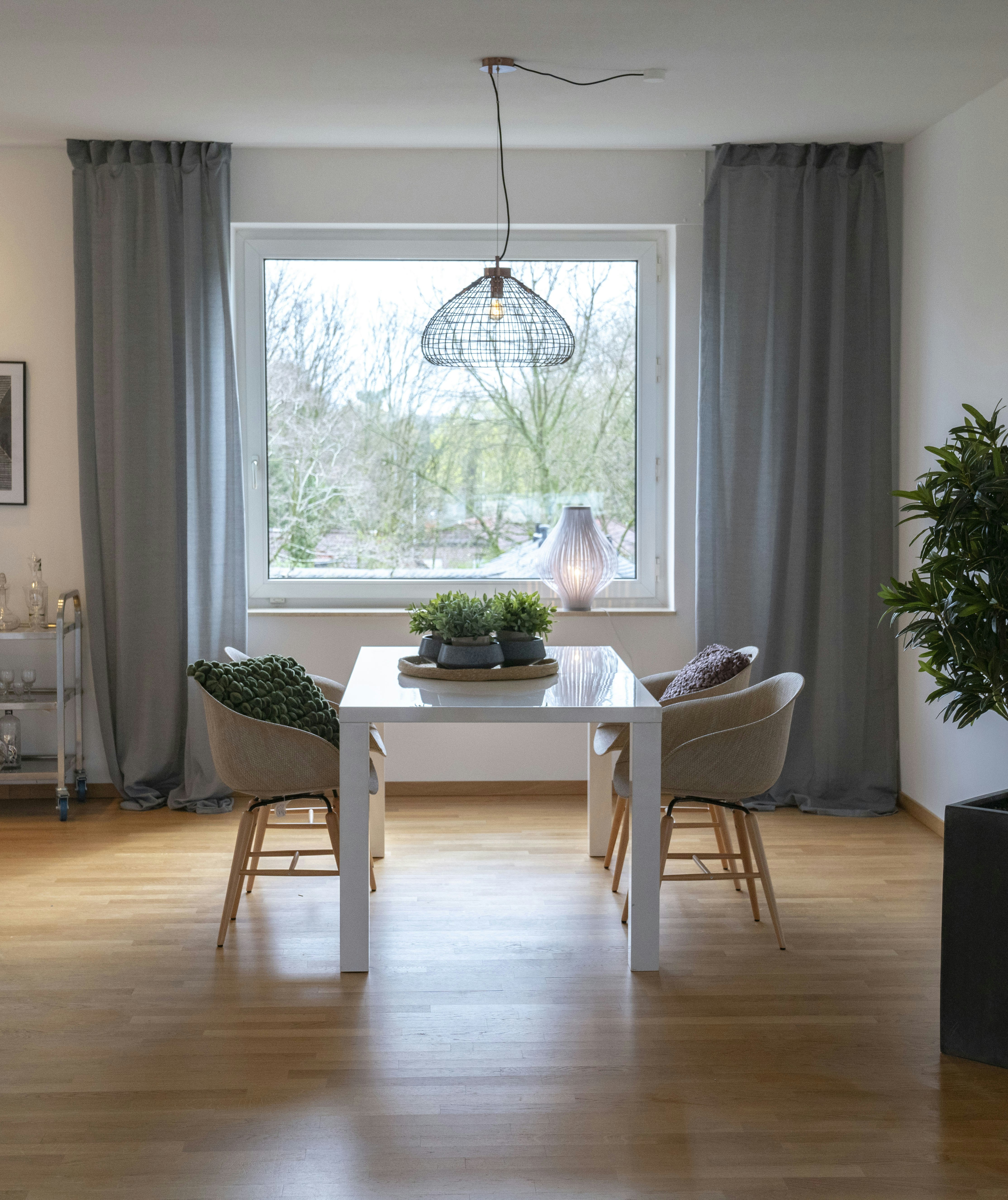 white wooden table with chairs
