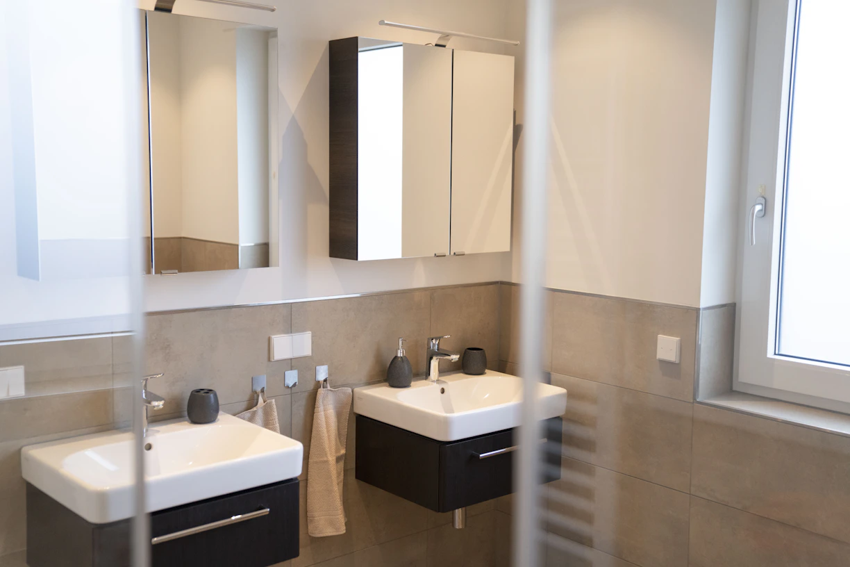 white ceramic sink with faucet