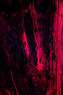 A vibrant collage of layered pink and red hues swirling like a living painting, evoking passion and connection.