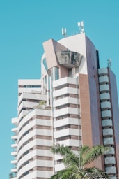 white concrete building under blue sky during daytime
