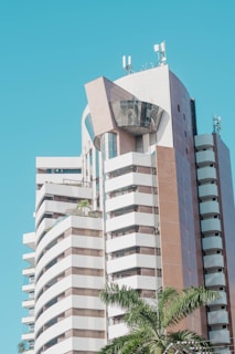 white concrete building under blue sky during daytime