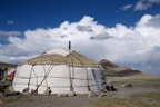 white tent under blue sky during daytime